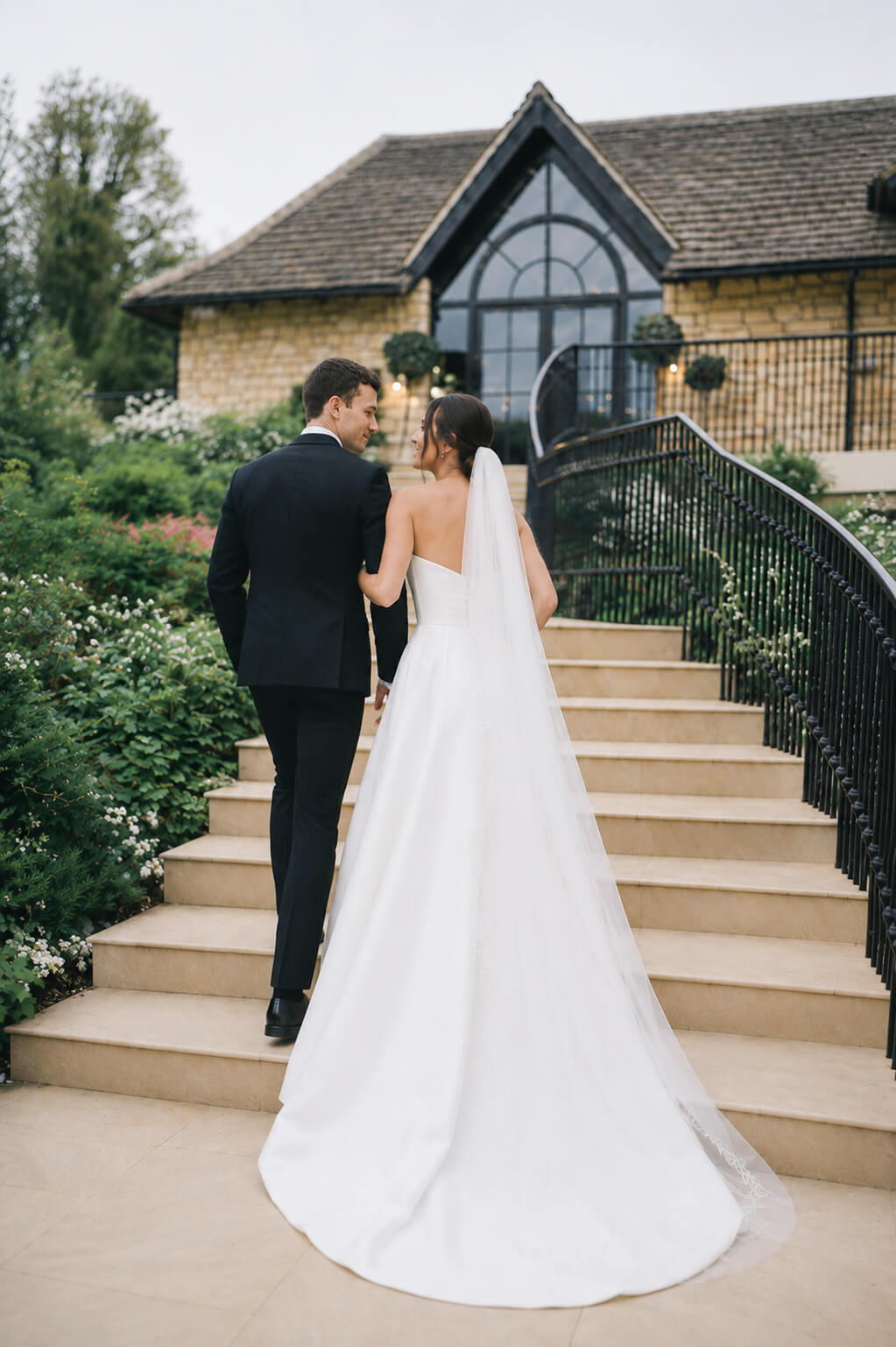 Bride in her white wedding dress at golden hour