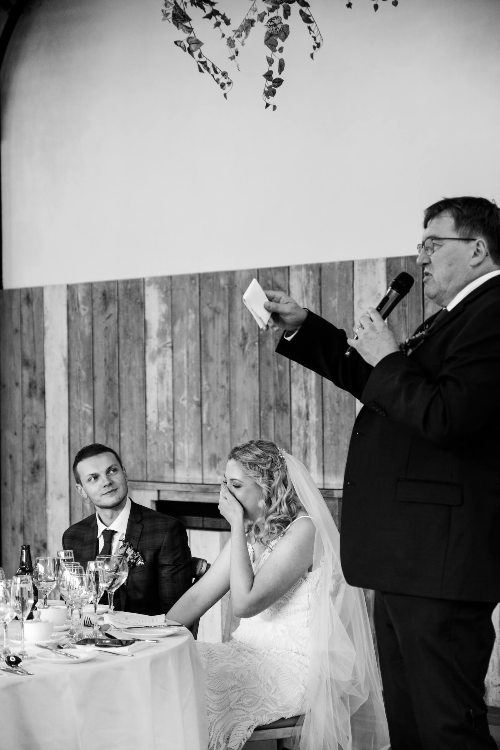 Wedding speeches at Foxtail Barns photographed in black and white