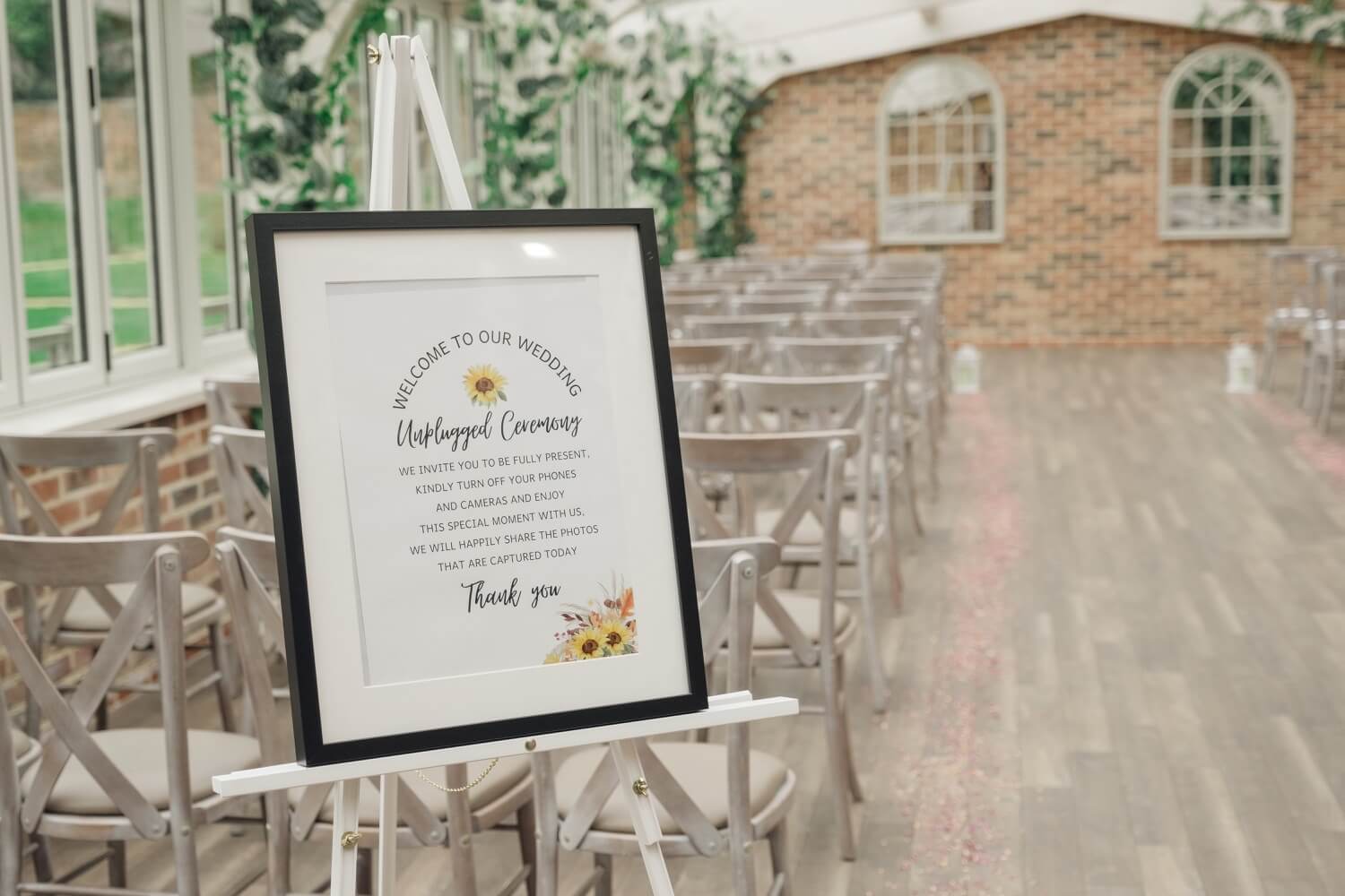 The empty orangery ceremony room ready for a wedding at Foxtail Barns