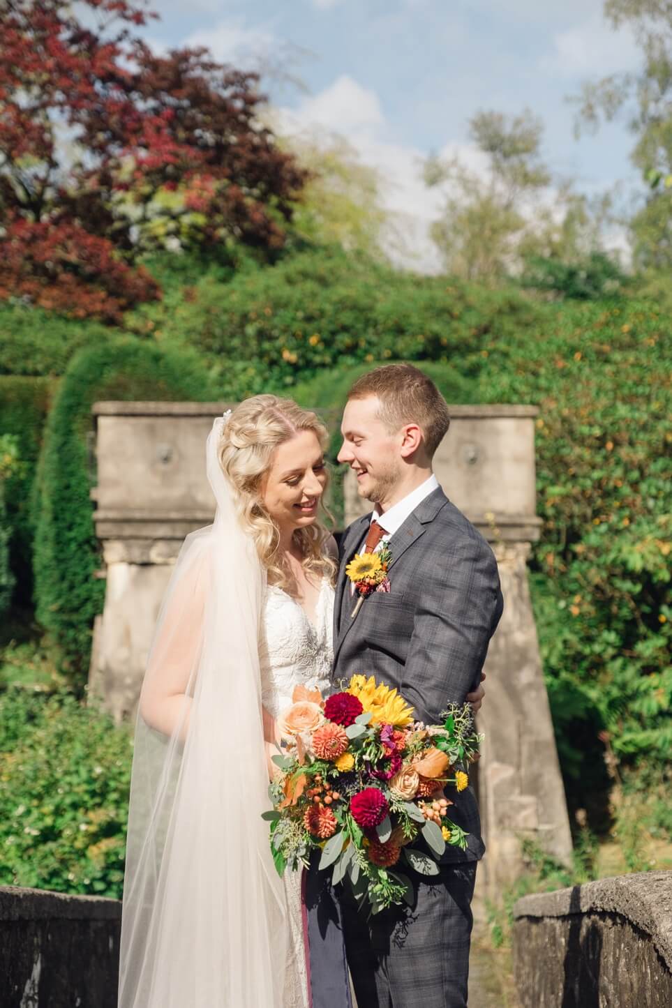 Bride and groom portrait in the gardens at Foxtail Barns