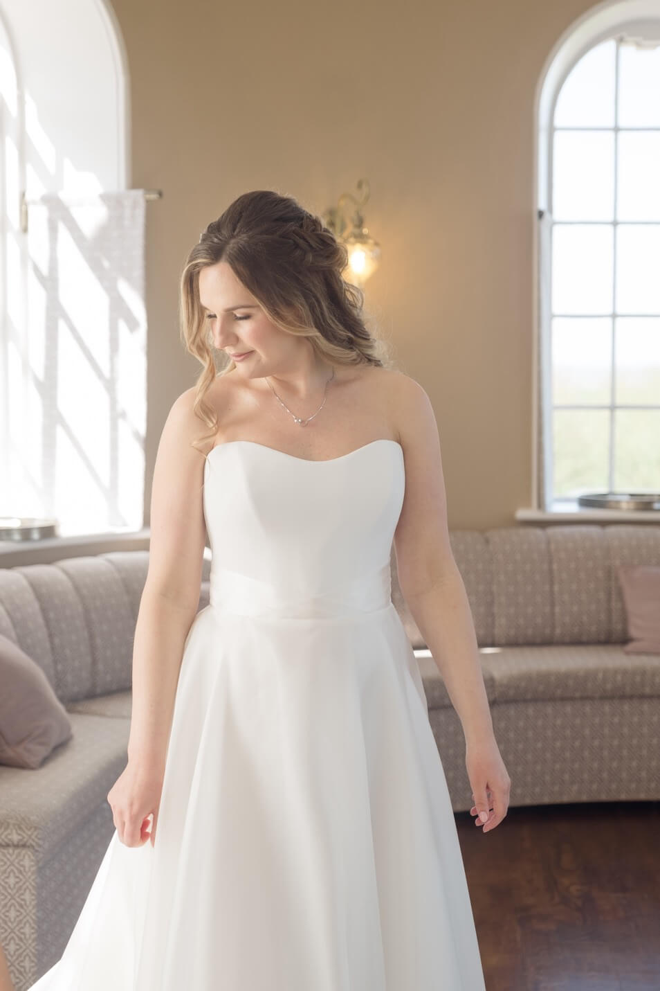 Bride in her wedding dress at Hawkstone Hall