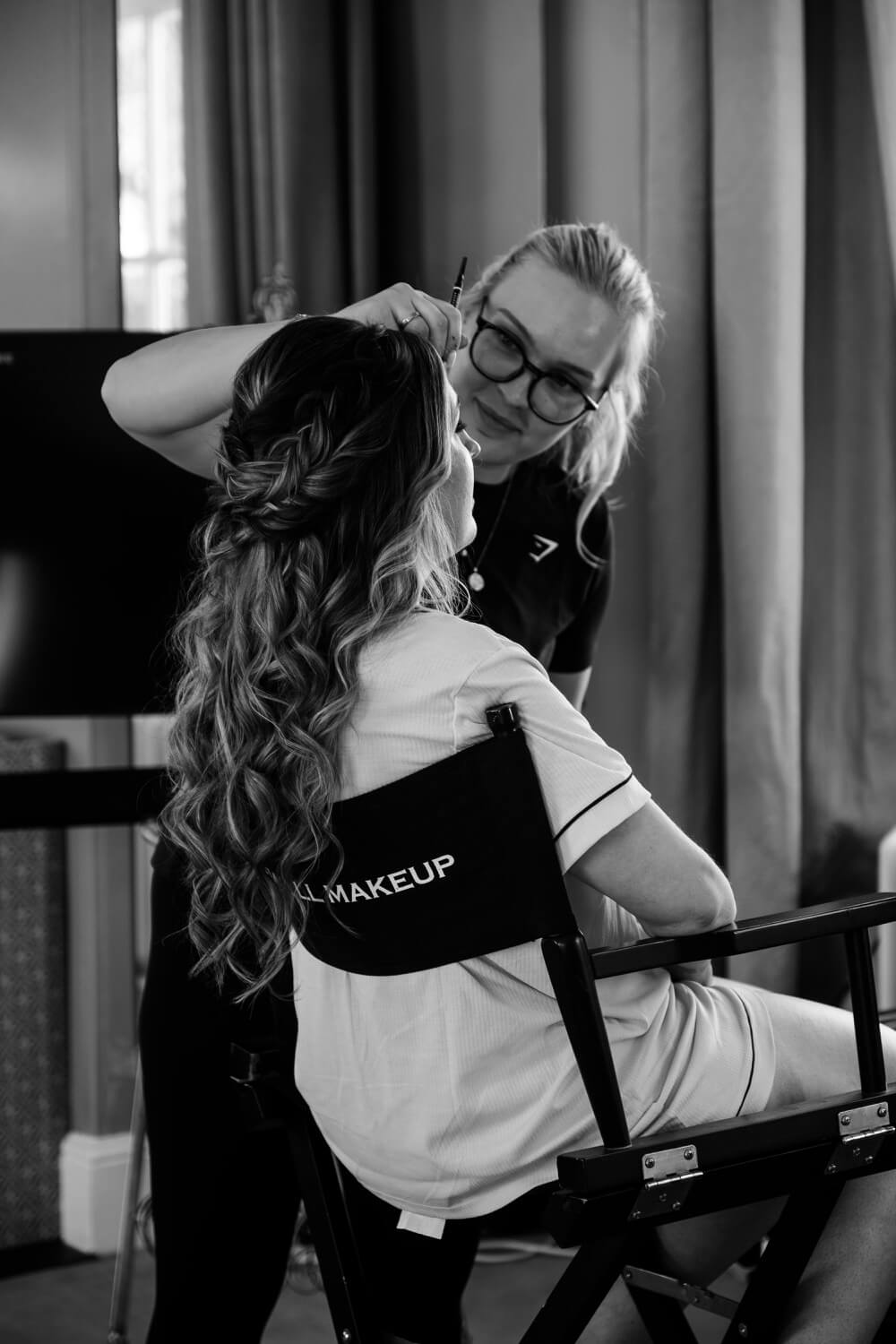 Bride having her makeup done at Hawkstone Hall