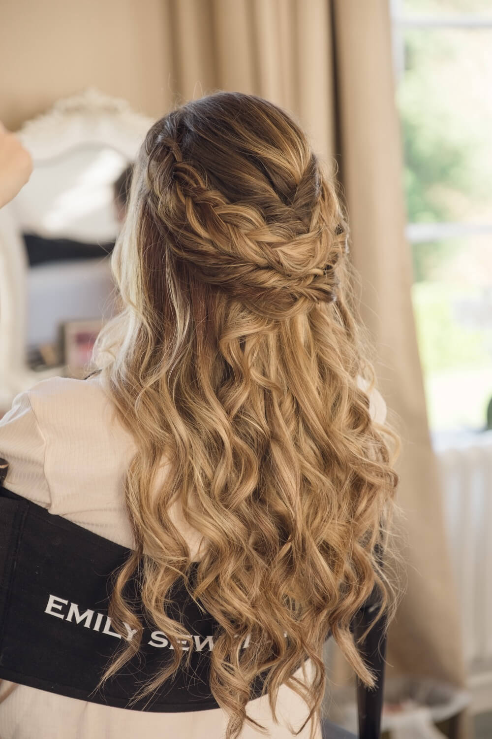 Bride's hair being finished at Hawkstone Hall