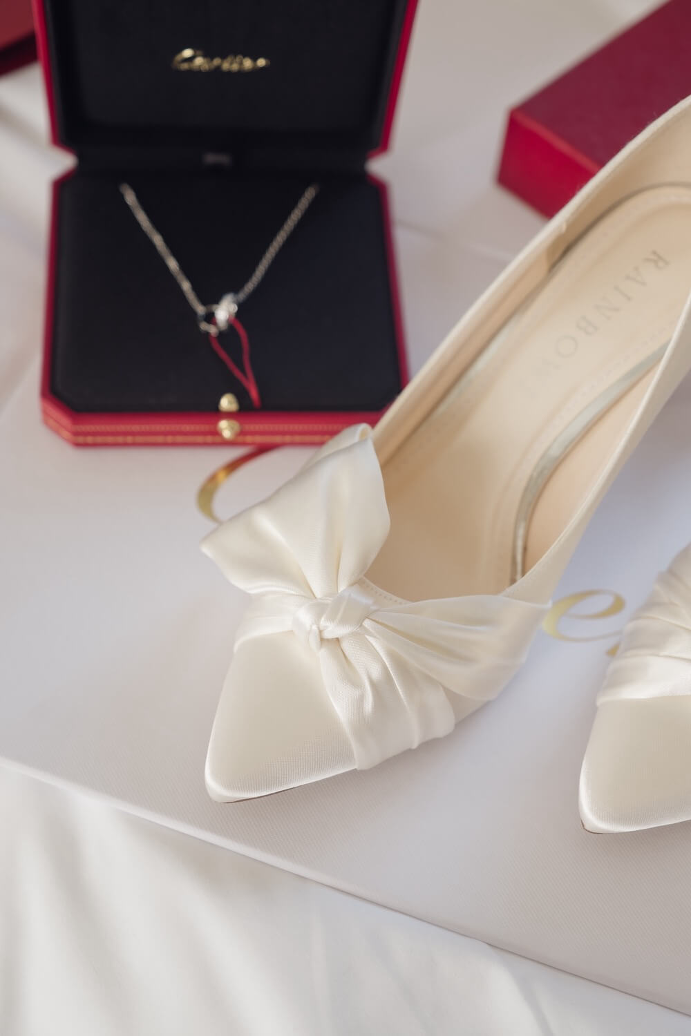 Bridal shoes and ring details at Hawkstone Hall