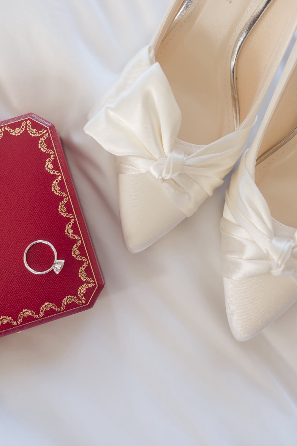 Wedding shoes and rings at Hawkstone Hall