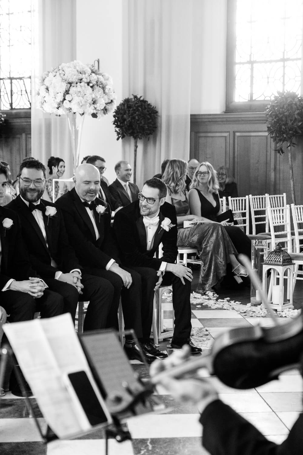 Groom seated with his best men before the ceremony at Hawkstone Hall