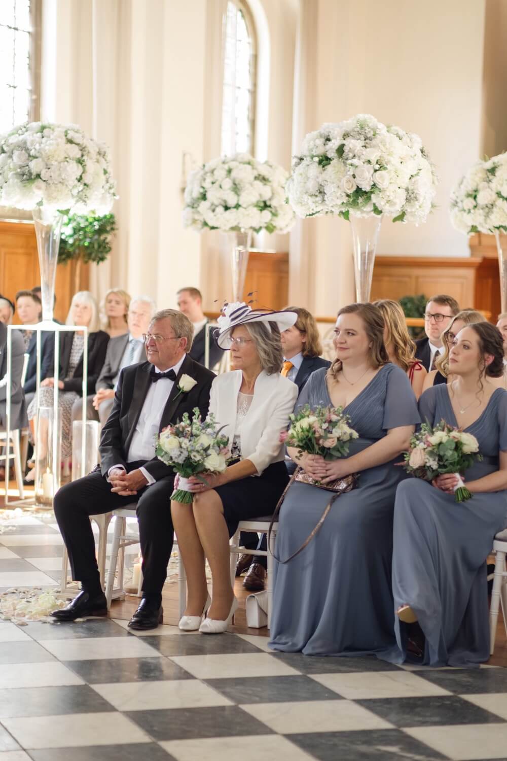Family seated for the ceremony at Hawkstone Hall