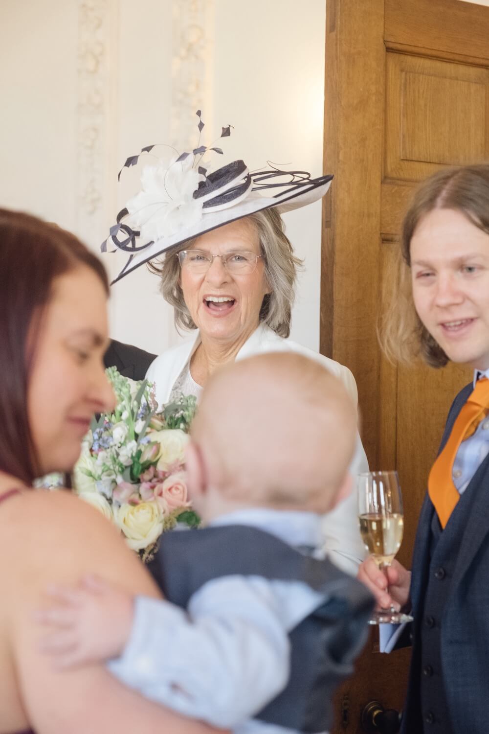 Mother of the bride smiling at Hawkstone Hall