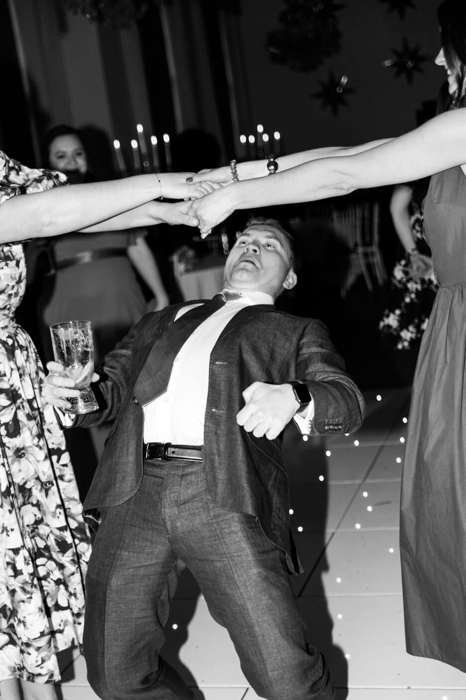Guest doing the limbo at the Hawkstone Hall evening reception