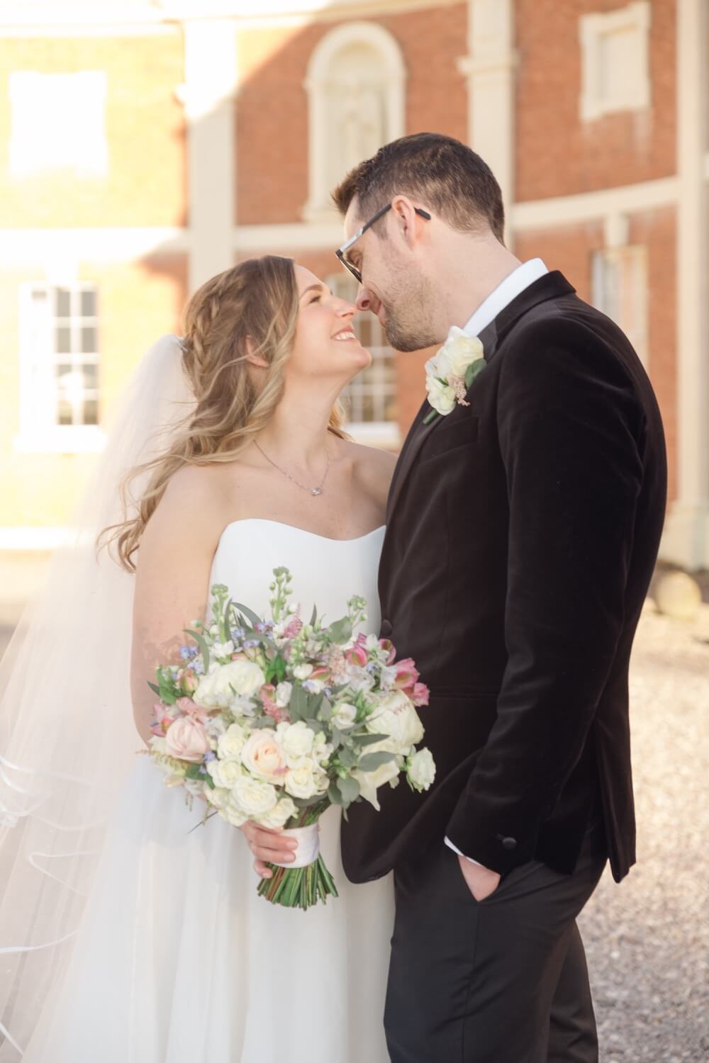 Bride and groom portrait outside Hawkstone Hall