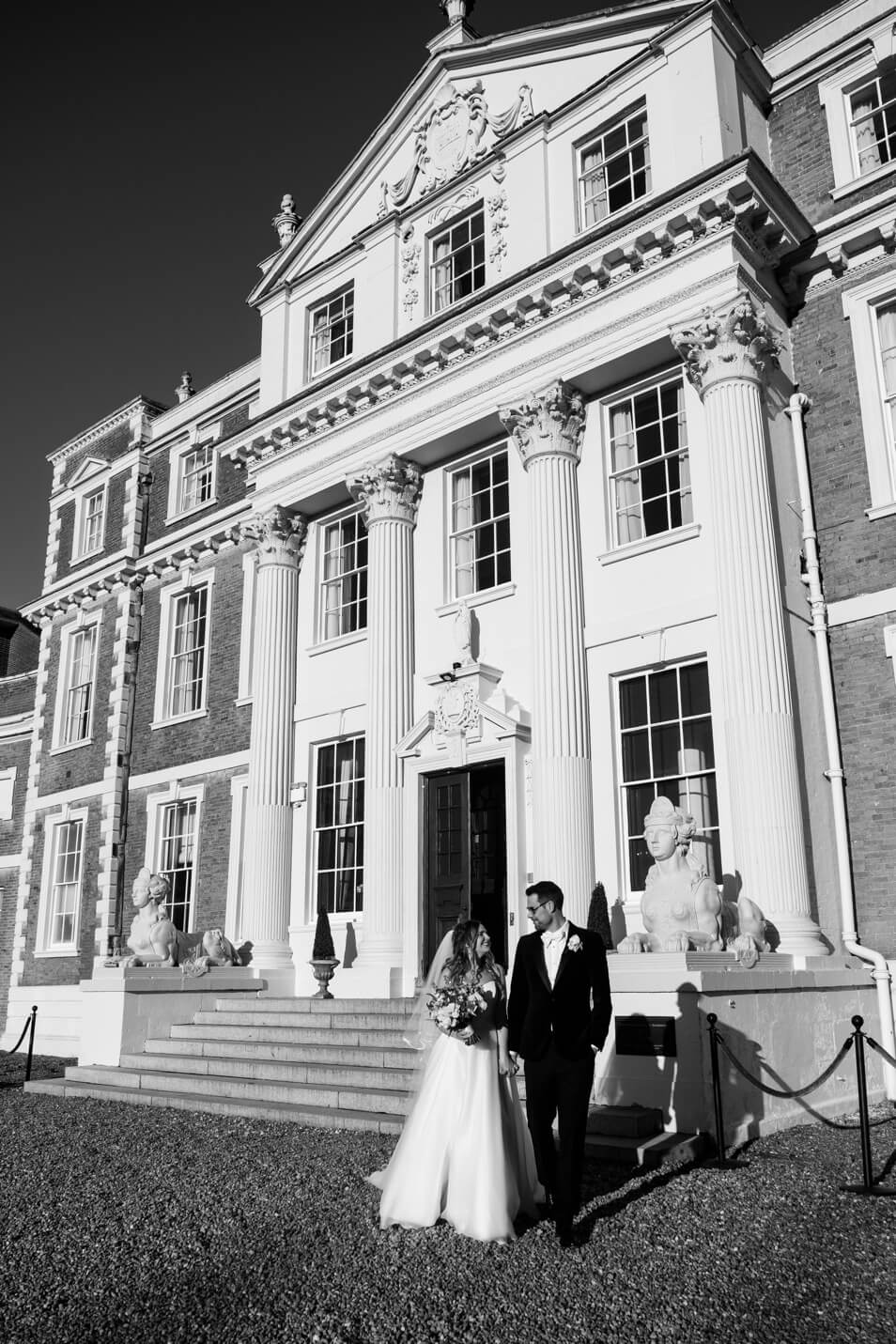 Black and white portrait outside Hawkstone Hall in Shropshire