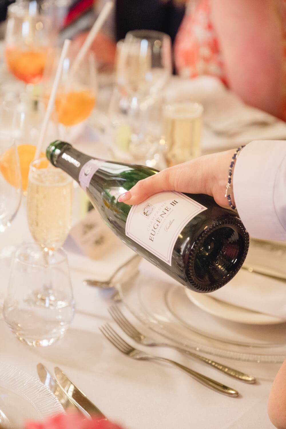 Champagne being poured at the Hawkstone Hall wedding breakfast