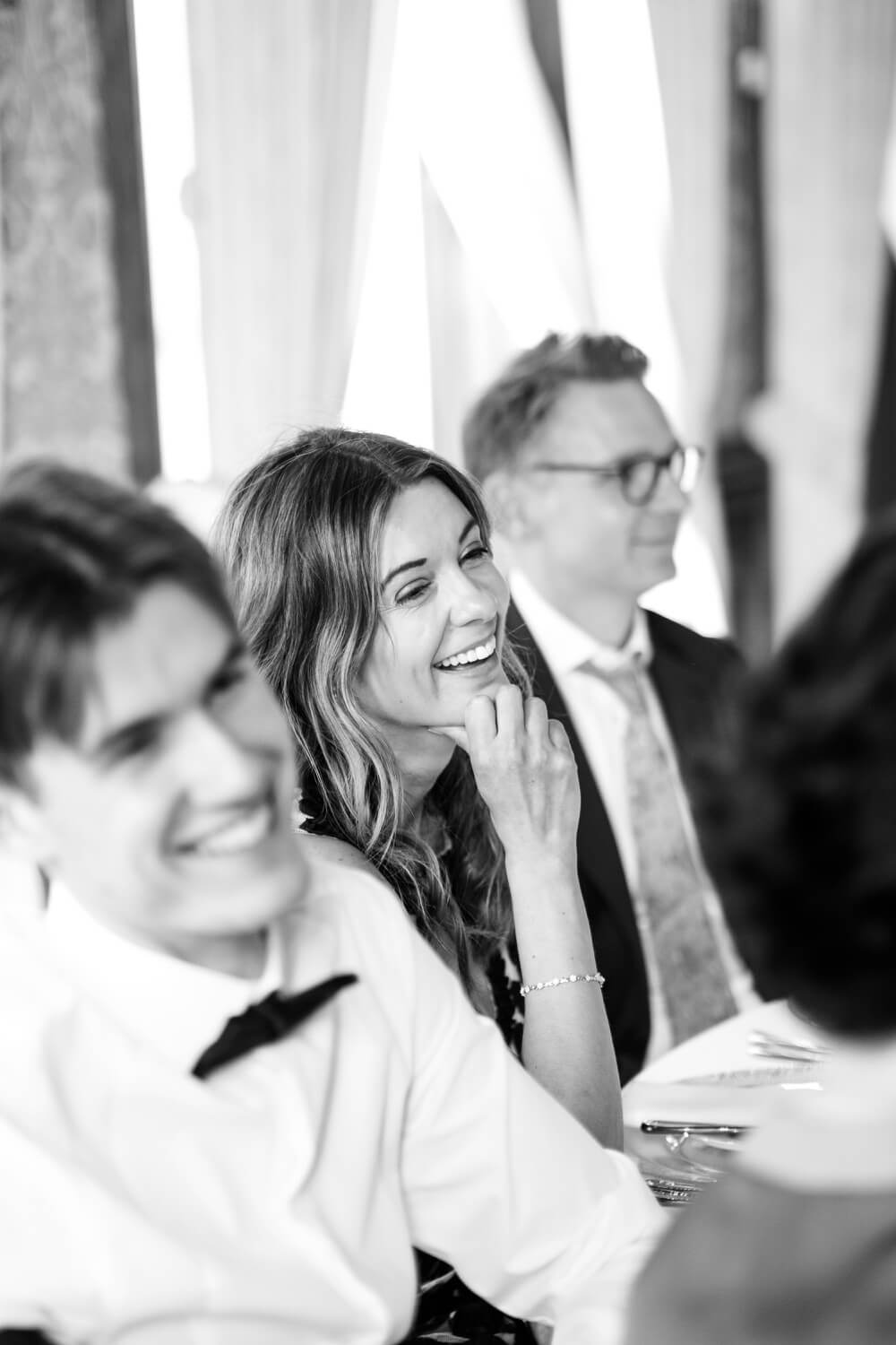 Guest laughing during the speeches at Hawkstone Hall