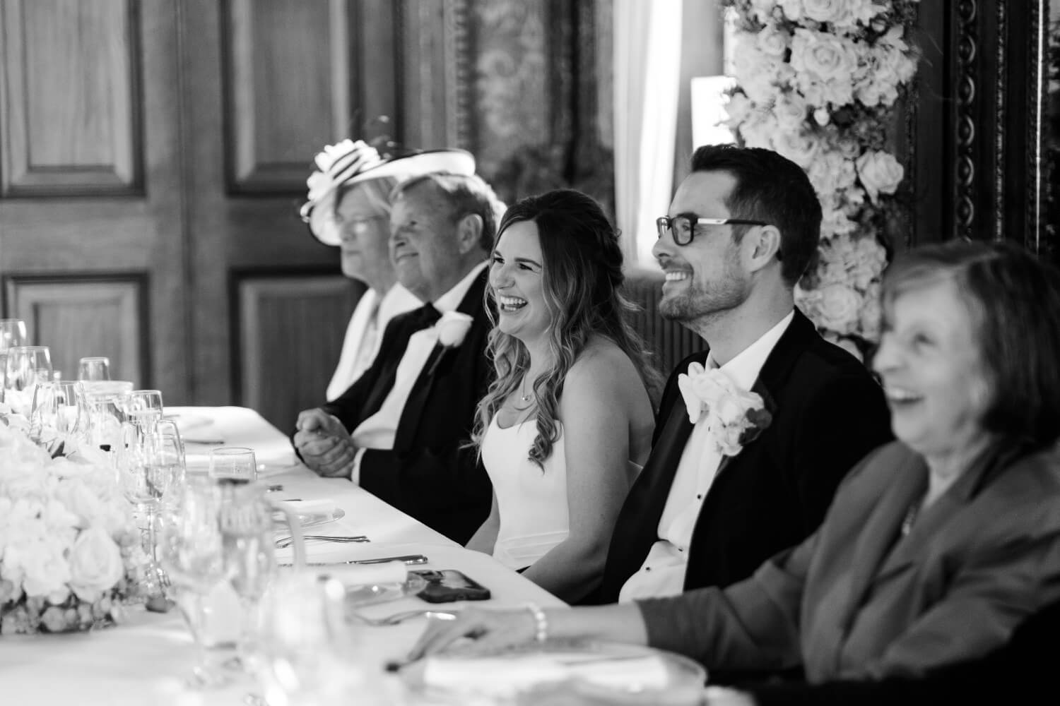 Top table laughing during the speeches at Hawkstone Hall
