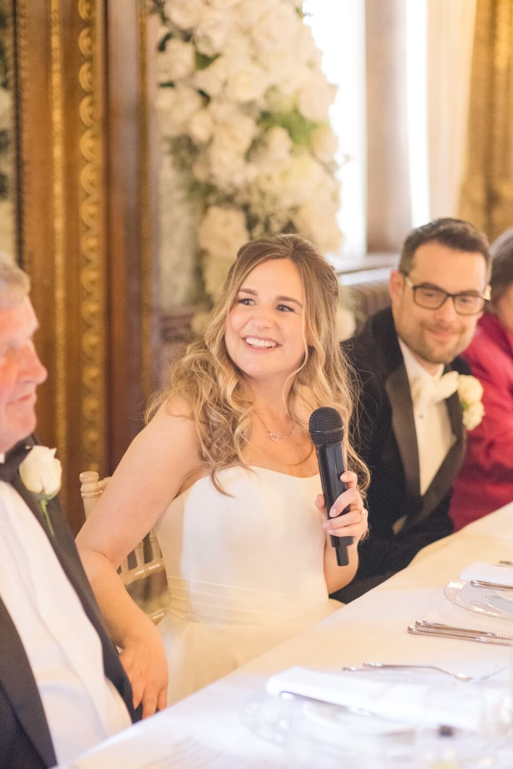 Bride speaking during the wedding breakfast at Hawkstone Hall