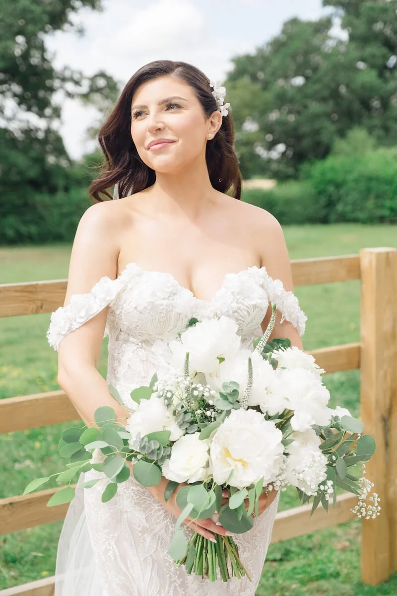 Bride alone in her wedding dress