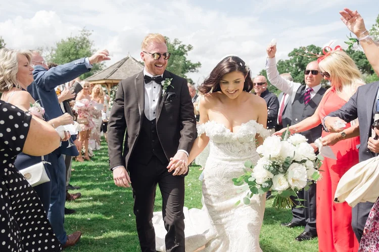 Confetti as the couple leave the ceremony