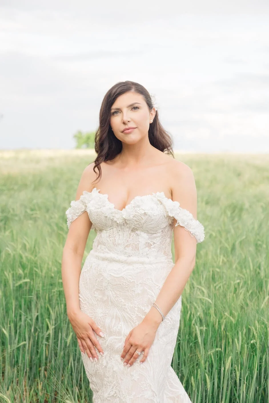Bride alone in the field at Manor Hill House