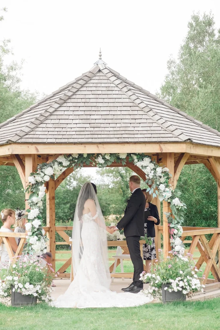 Bride and groom in the ceremony hut