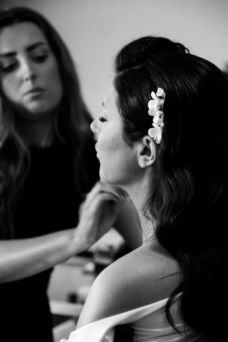Bridal makeup during morning preparations