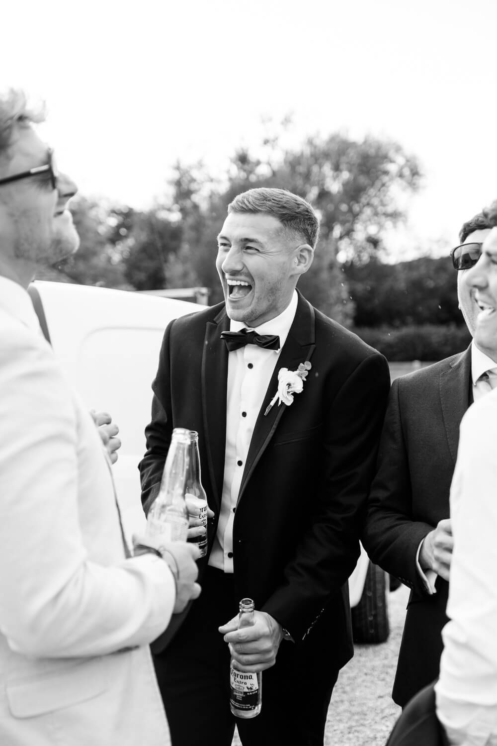 Laughing guest during the drinks reception