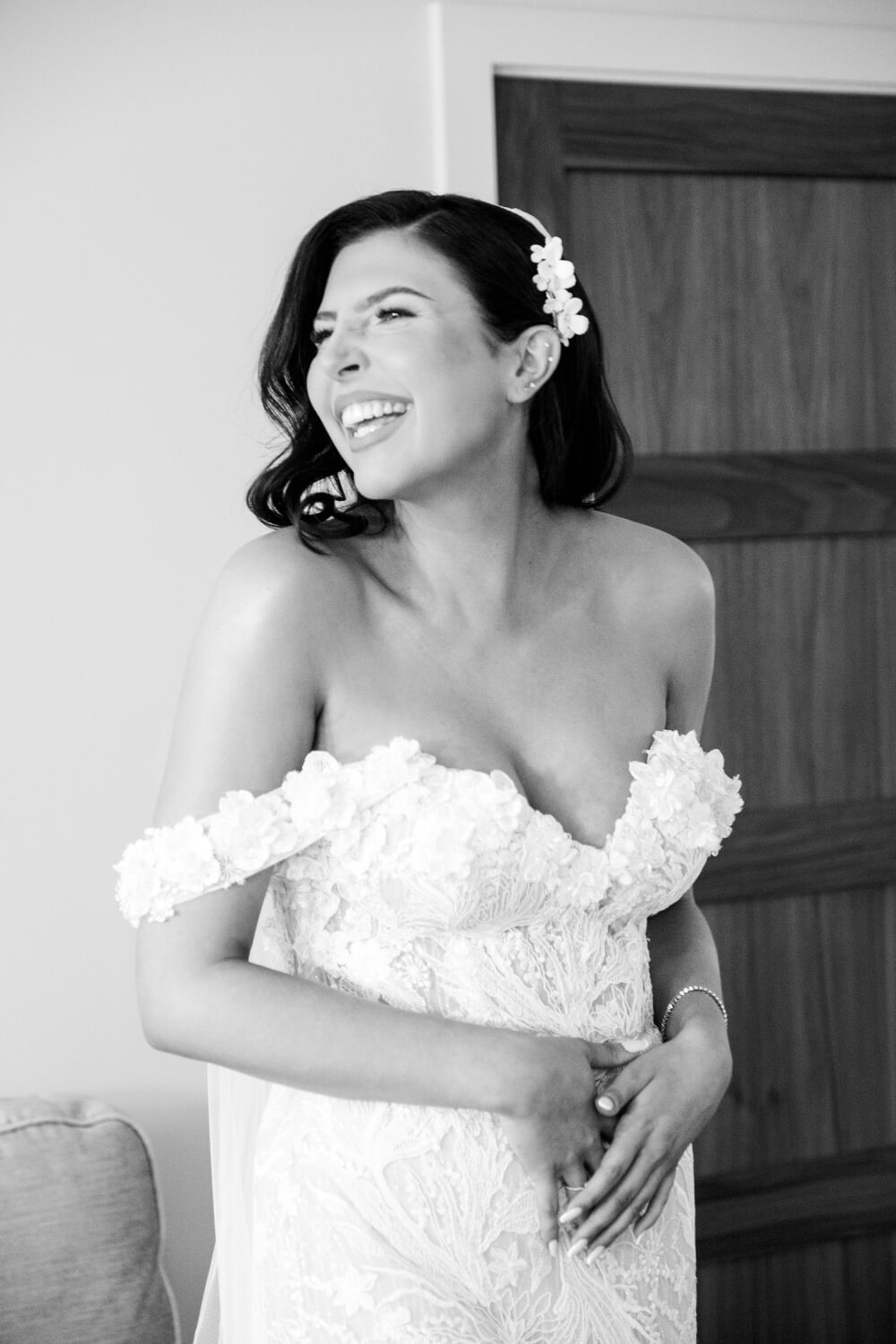 Bride laughing during bridal preparations