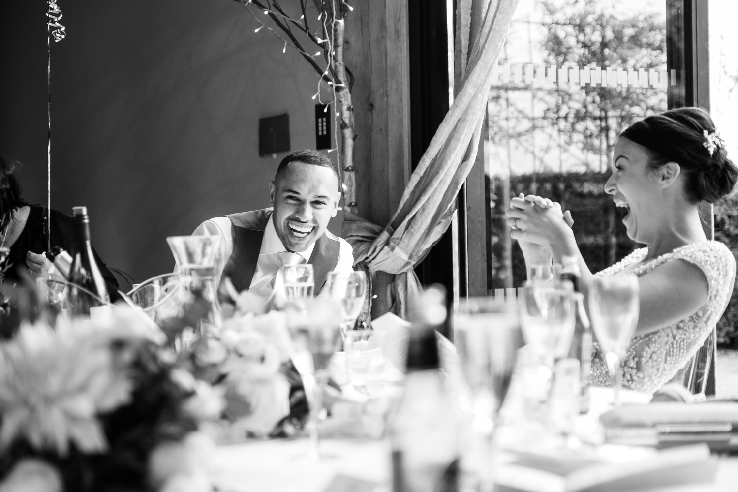 Bride and groom stunned by the best man's story during the speeches
