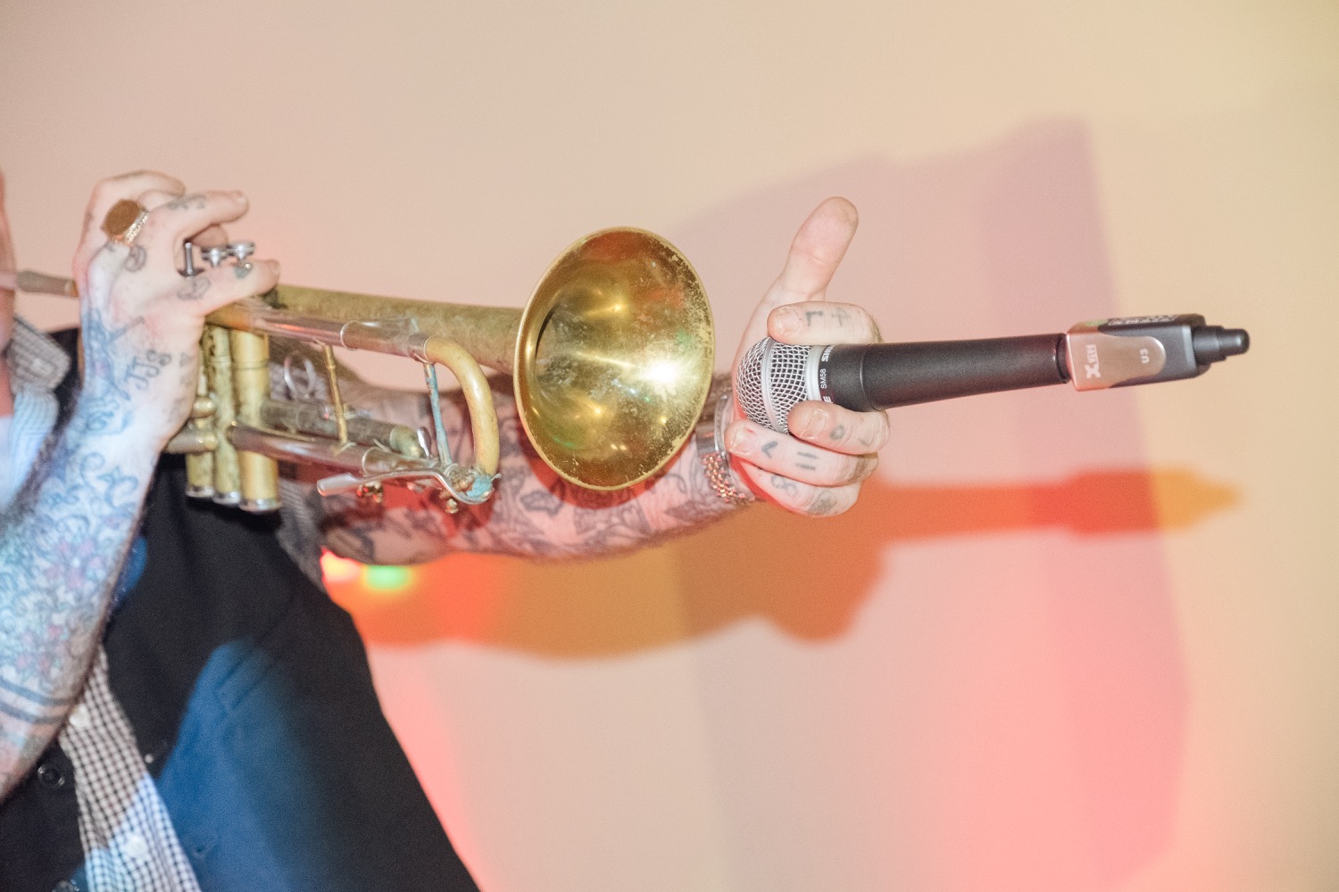 Trumpeter performing on the dance floor at Redhouse Barn