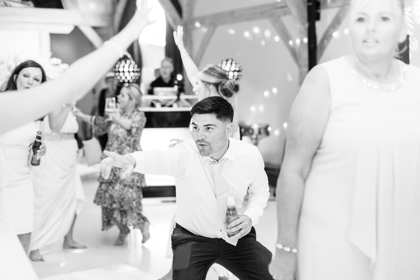Wedding guest dancing at Redhouse Barn