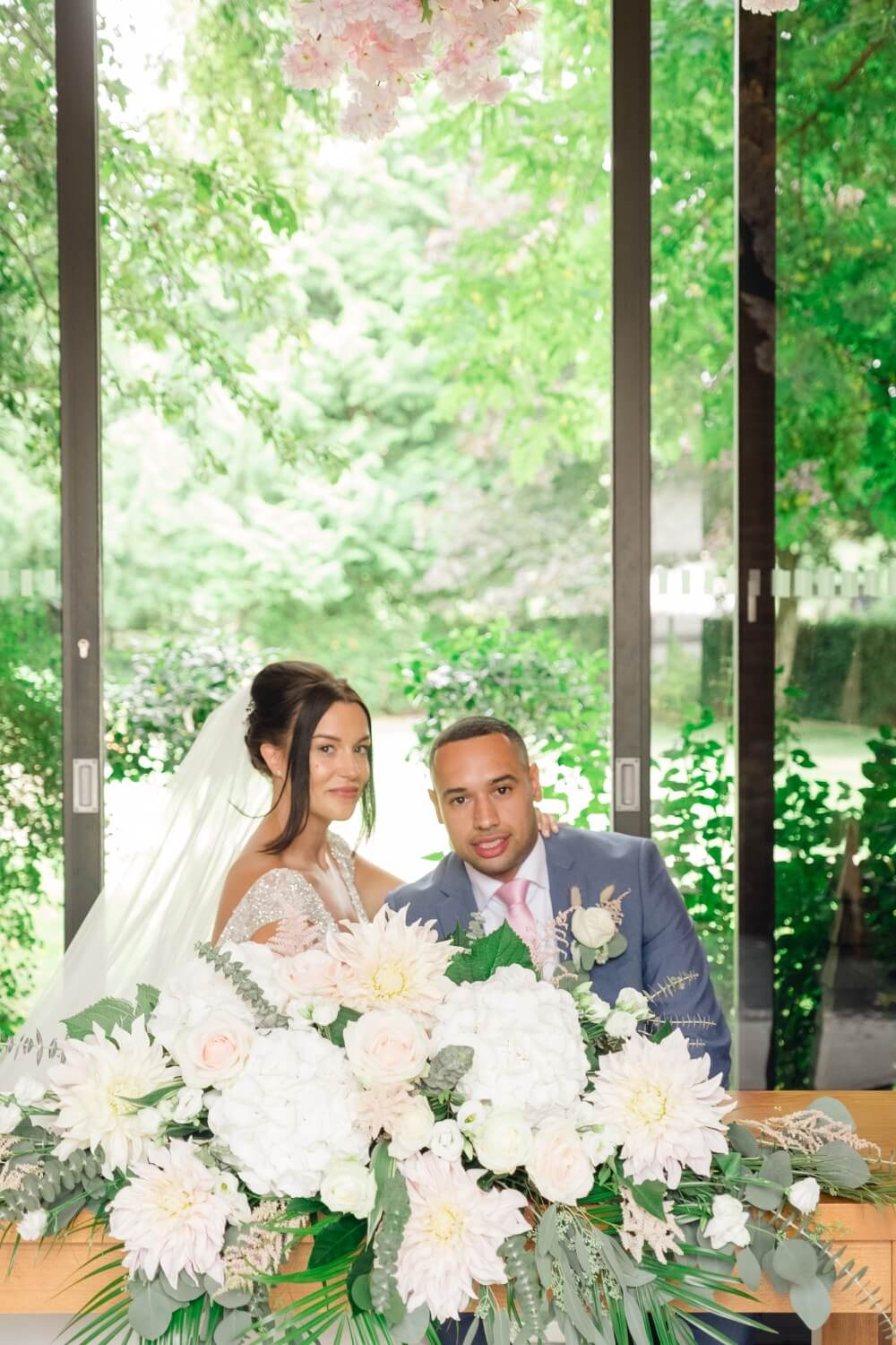 Bride and groom just after signing the register at Redhouse Barn