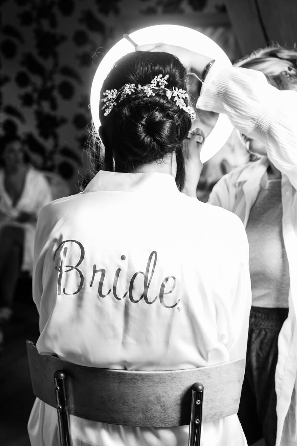 Bride having her makeup done on the morning of her Redhouse Barn wedding