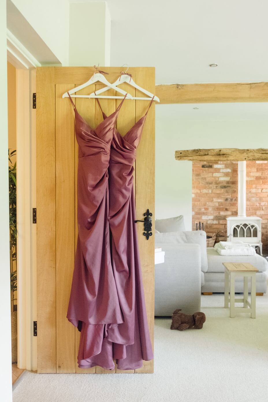 Wedding dresses hanging ready on the morning of a Shustoke Barn wedding