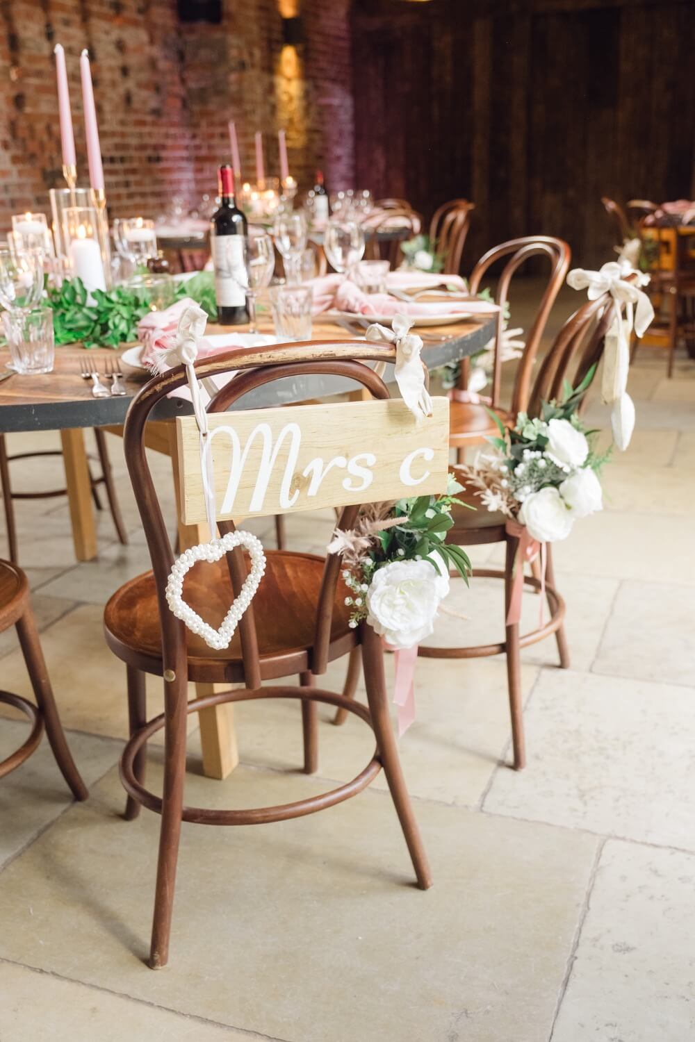Table decorations styled for the wedding breakfast at Shustoke Barn