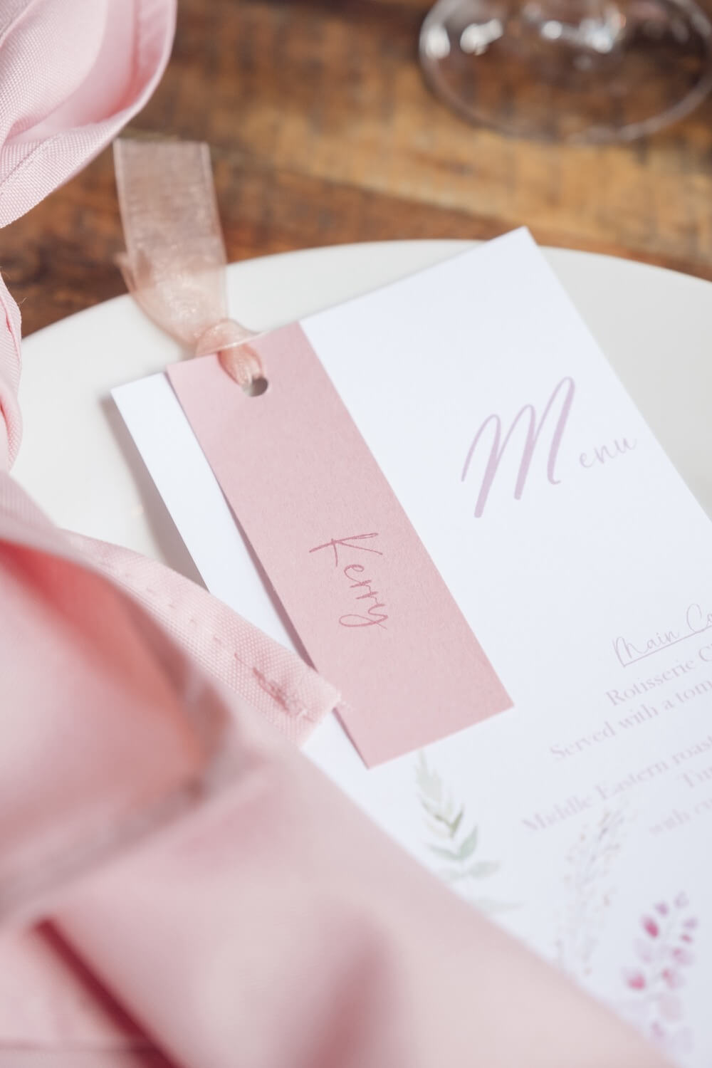 Wedding table decoration details inside Shustoke Farm Barns