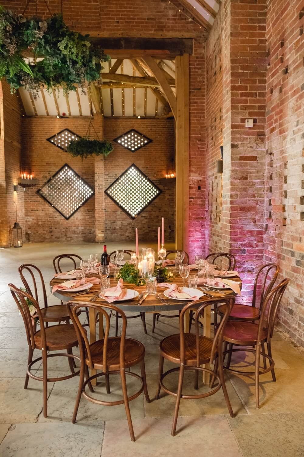 Wedding breakfast table set for the meal at Shustoke Barn