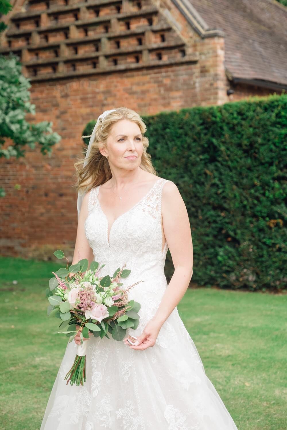 Bride portrait in the grounds at Shustoke Barn