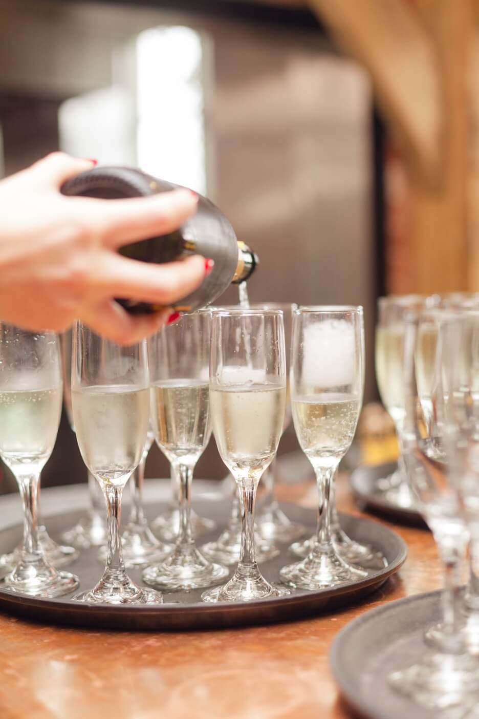 Champagne being poured for the wedding toasts