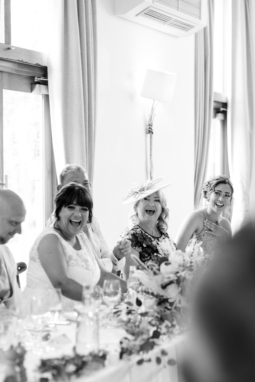 The top table laughing during the speeches at Mythe Barn