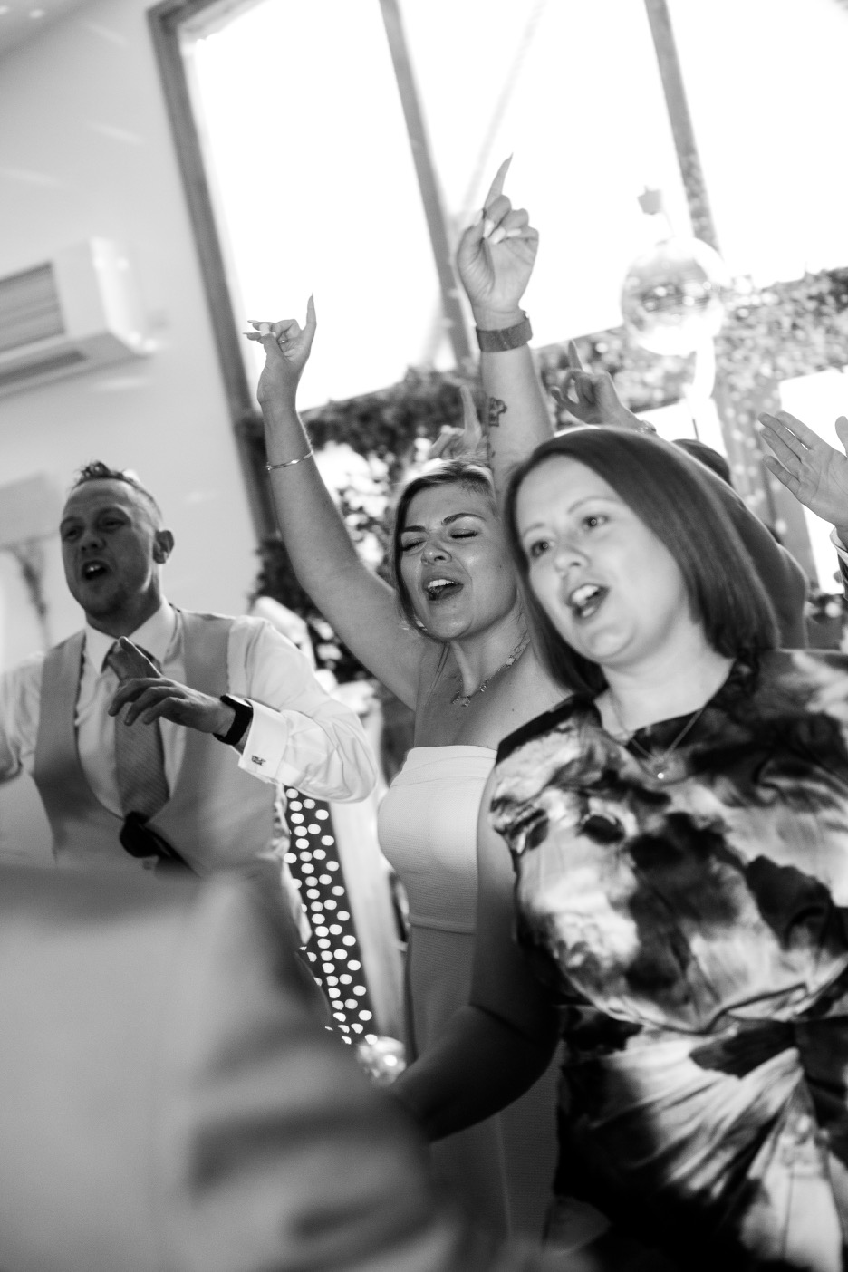 Guests dancing at the evening party at Mythe Barn