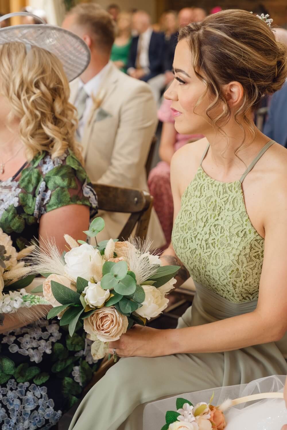 The bridesmaids watching the ceremony at Mythe Barn