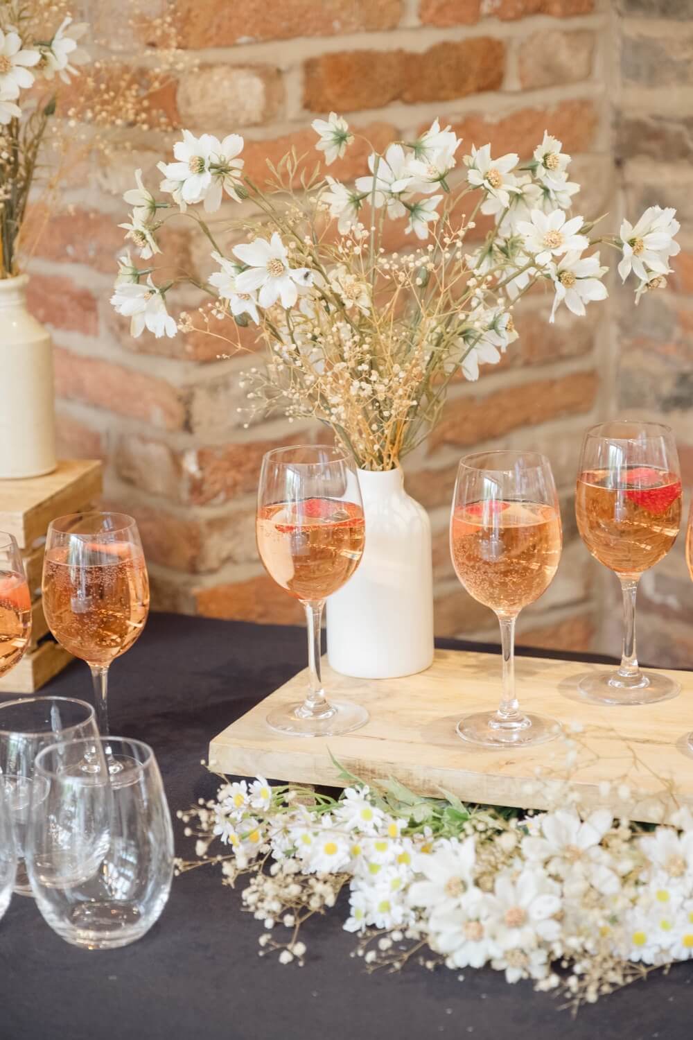A table of drinks at the Mythe Barn courtyard reception