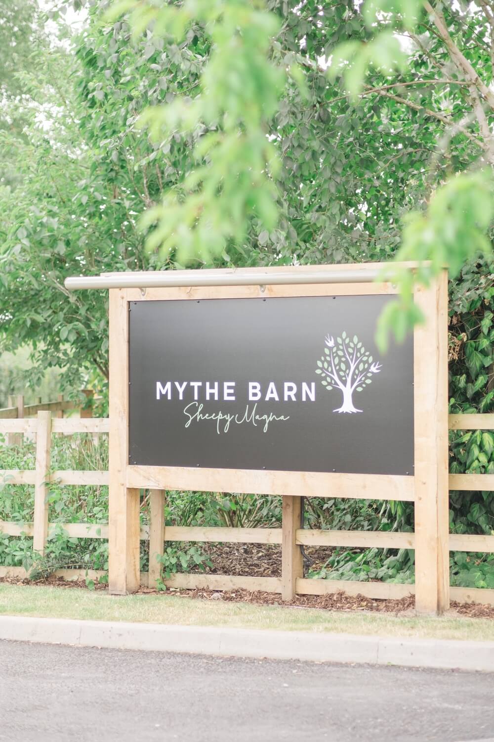 The Mythe Barn wedding venue sign