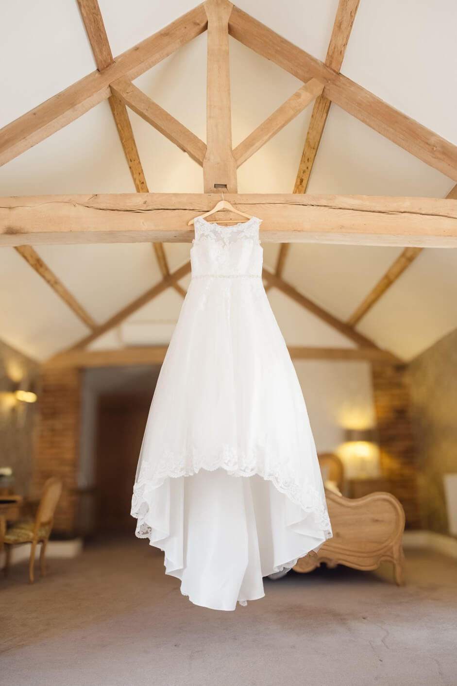 The bride's dress hanging before the ceremony