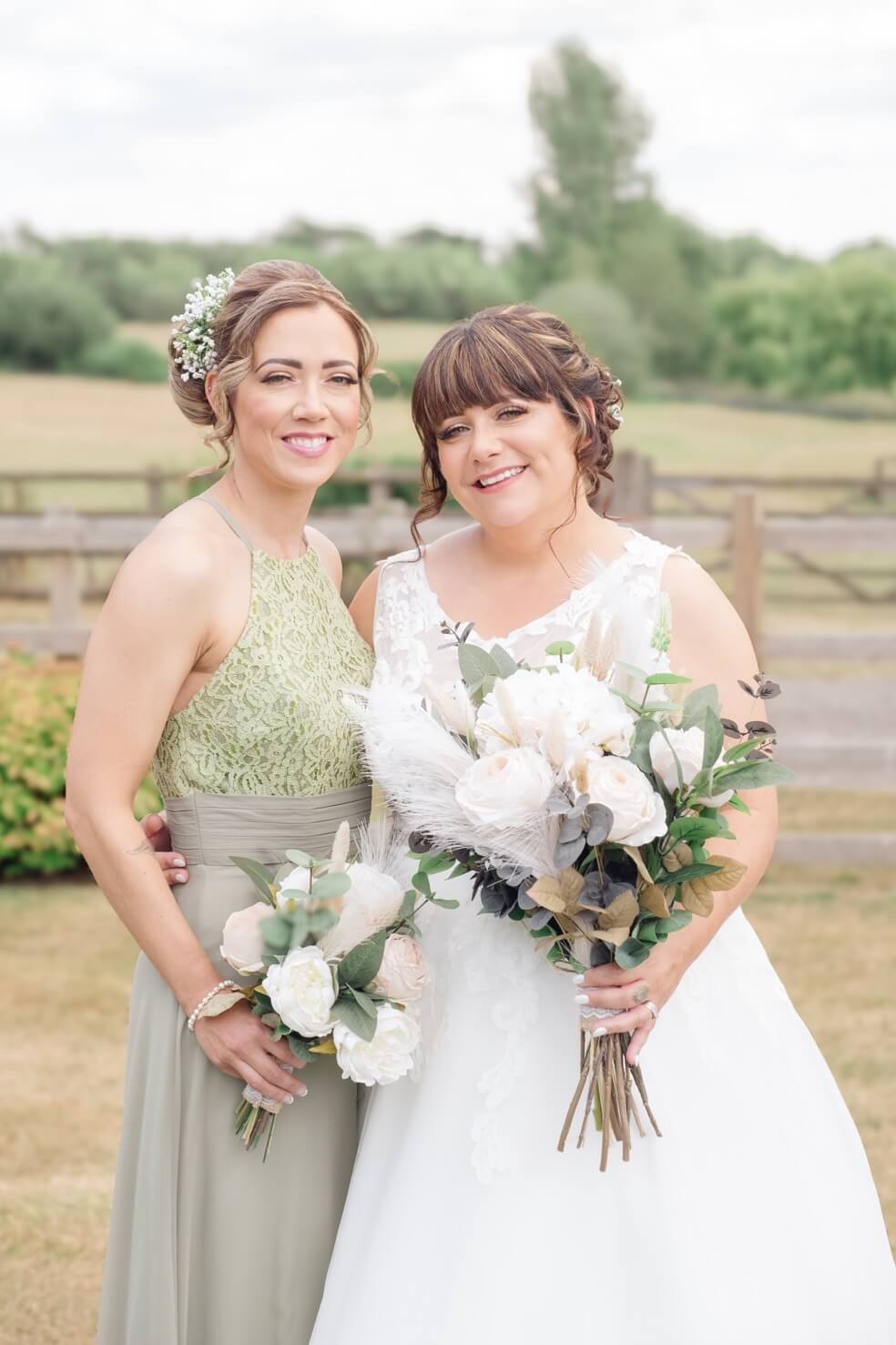 The bride with her maid of honour at Mythe Barn