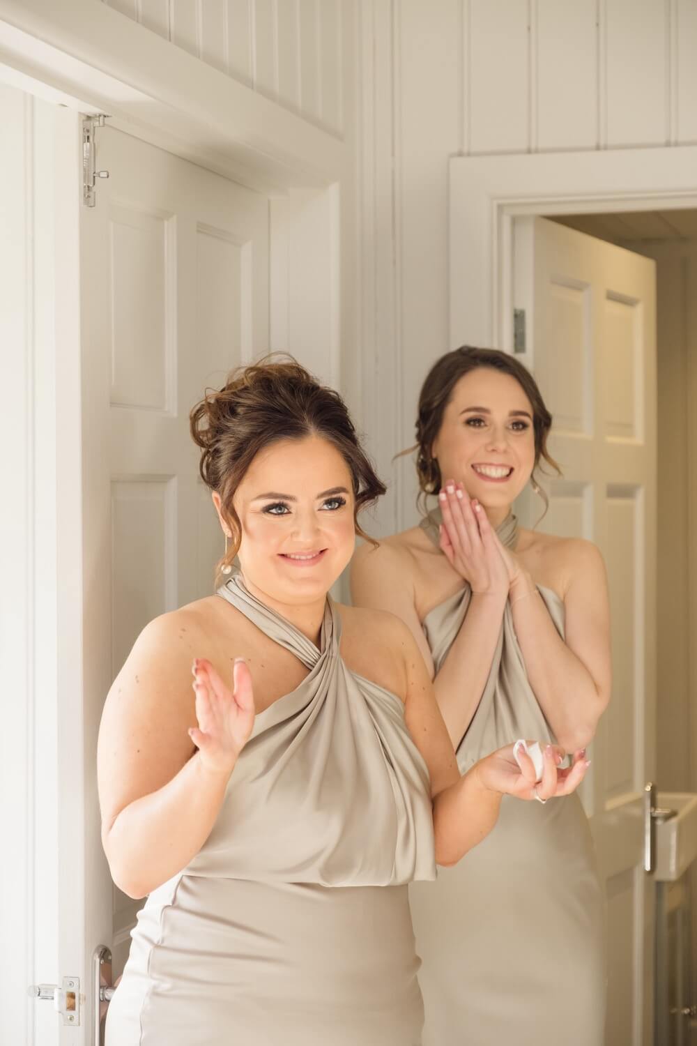 Emotional moment as the bridesmaids see the bride