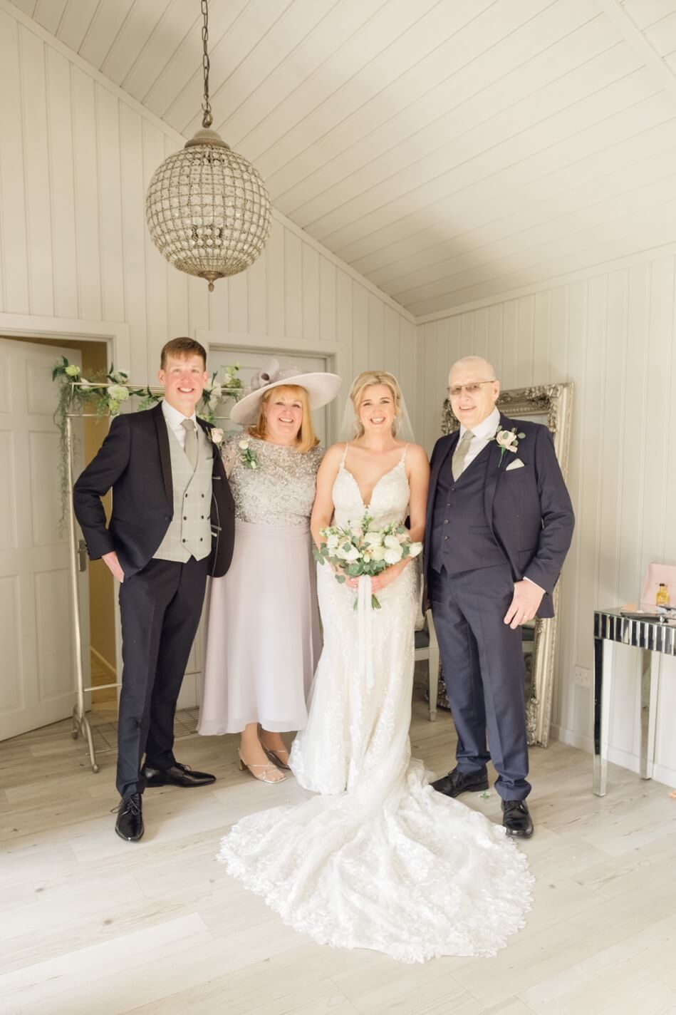Bride with her mother, father and brother on the morning