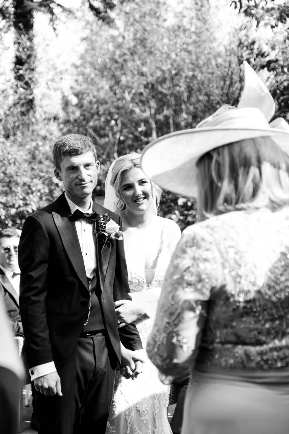Mother of the bride giving a reading during the ceremony