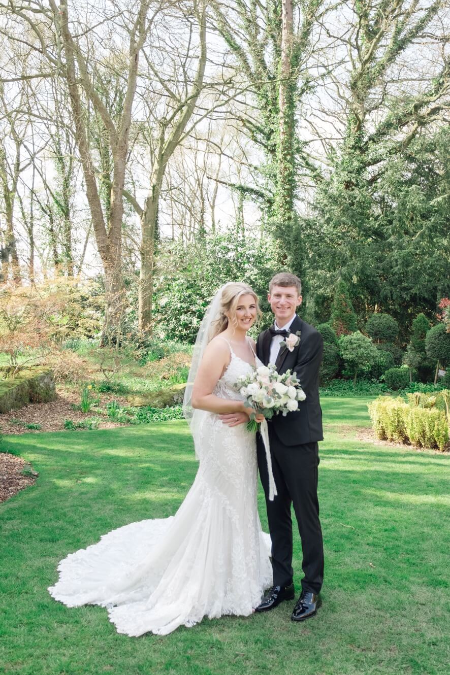 Bride and groom portrait in the grounds of Moxhull Hall