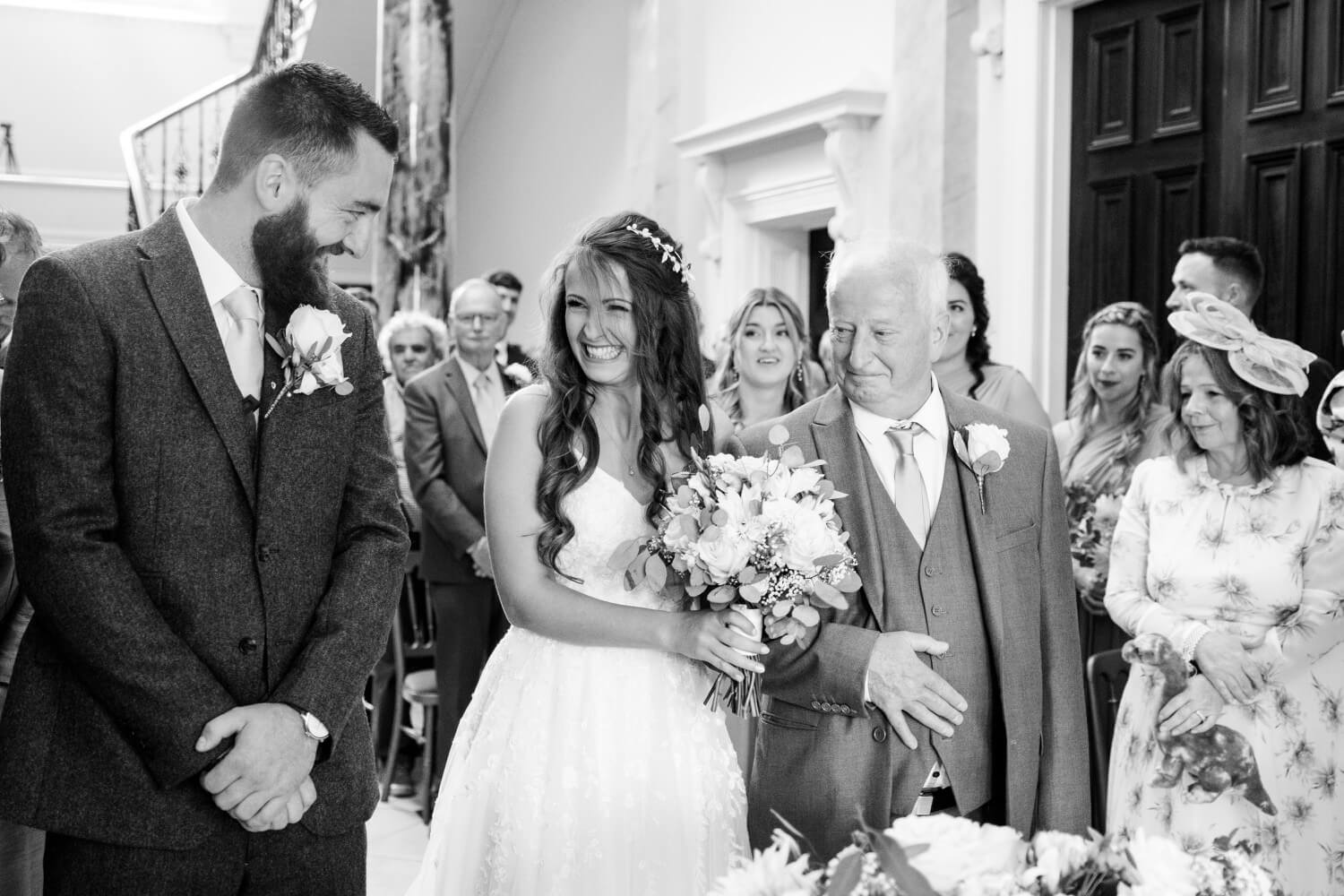 Annabelle and her dad reaching the top of the aisle at Netley Hall