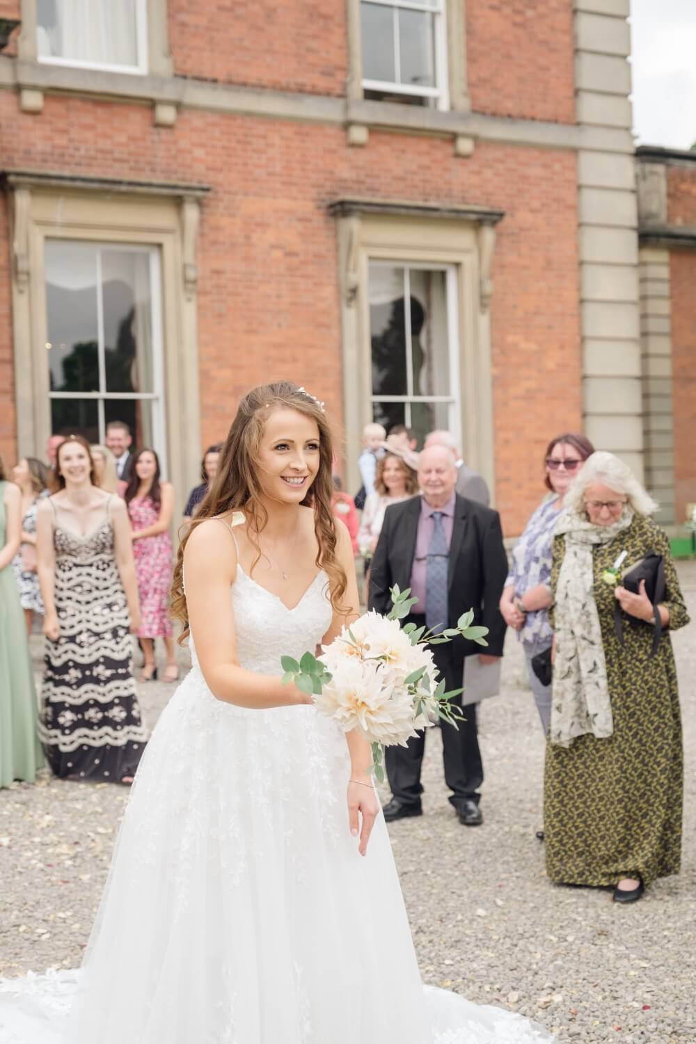 Annabelle throwing the bouquet